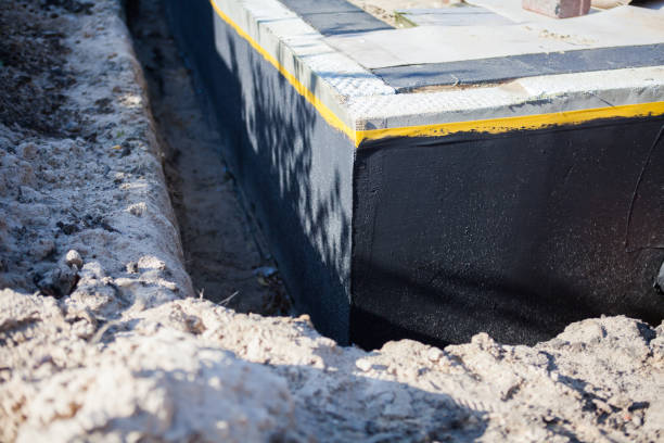 Professional Interior Drainage System technician working in Camillus, NY